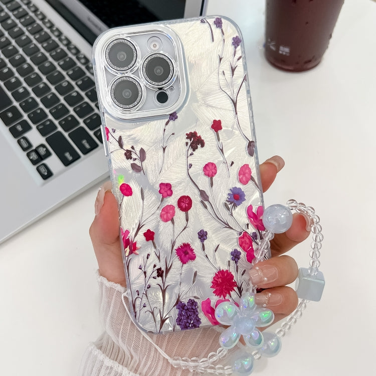 For iPhone 16 Pro Electroplating Flowers Plants Texture Wristband TPU Phone Case