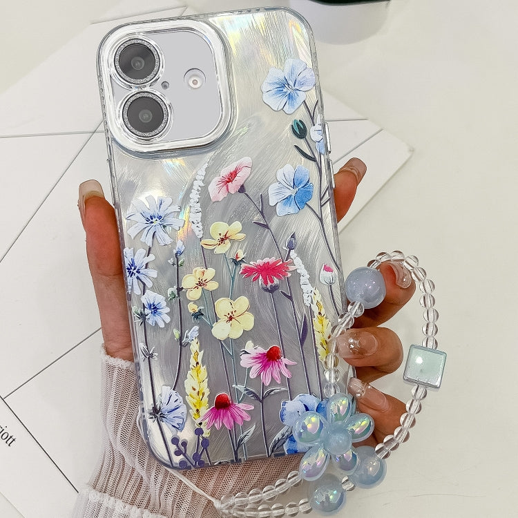 For iPhone 16 Plus Electroplating Flowers Plants Texture Wristband TPU Phone Case