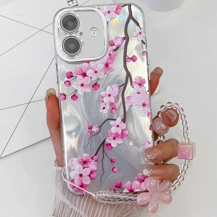 For iPhone 16 Plus Electroplating Flowers Plants Texture Wristband TPU Phone Case