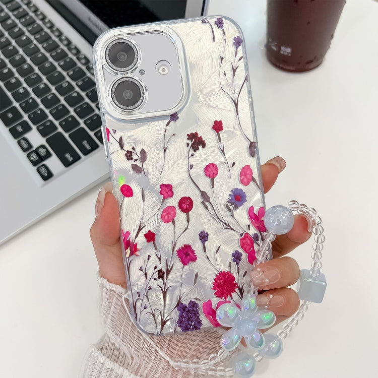 For iPhone 16 Plus Electroplating Flowers Plants Texture Wristband TPU Phone Case