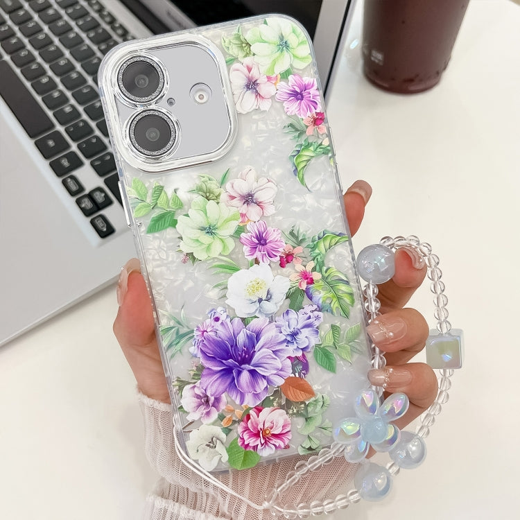 For iPhone 16 Plus Electroplating Flowers Plants Texture Wristband TPU Phone Case