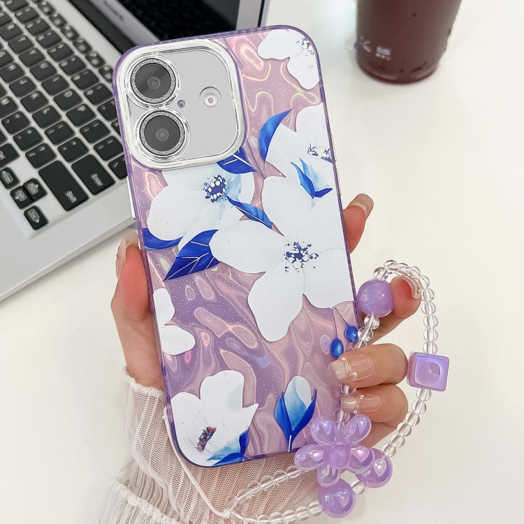 For iPhone 16 Electroplating Flowers Plants Texture Wristband TPU Phone Case