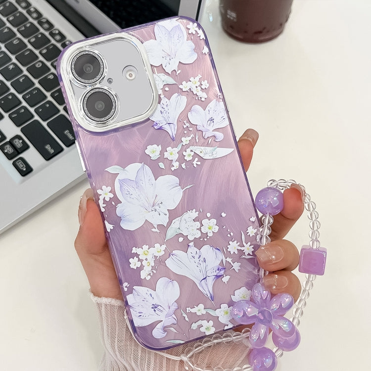 For iPhone 16 Electroplating Flowers Plants Texture Wristband TPU Phone Case