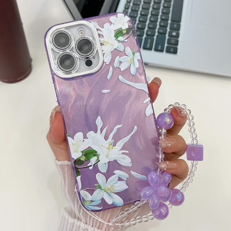 For iPhone 15 Pro Electroplating Flowers Plants Texture Wristband TPU Phone Case