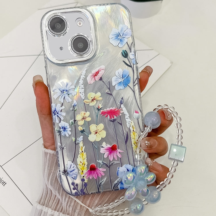 For iPhone 15 Electroplating Flowers Plants Texture Wristband TPU Phone Case