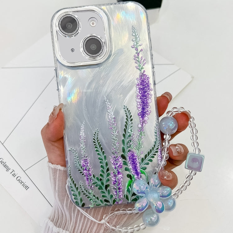 For iPhone 15 Electroplating Flowers Plants Texture Wristband TPU Phone Case