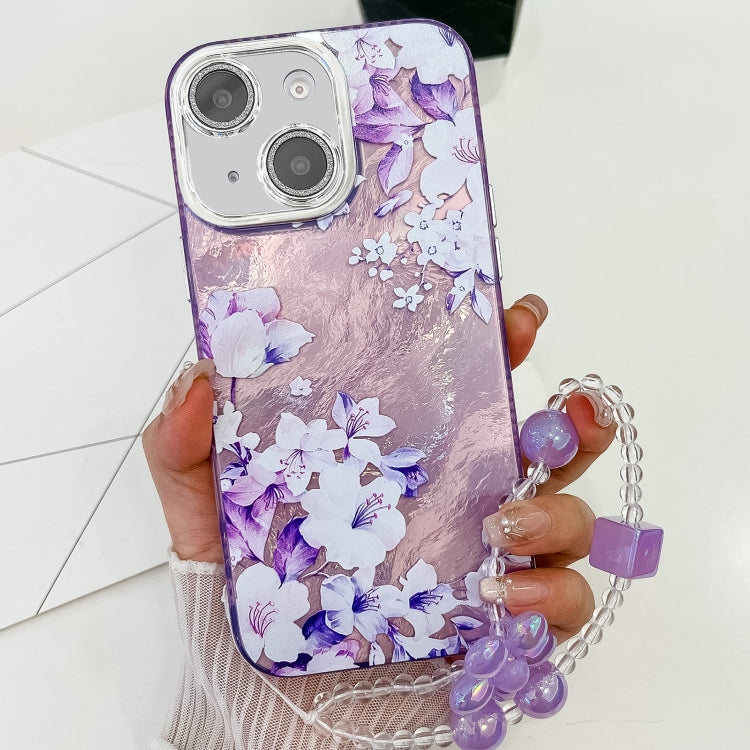 For iPhone 15 Electroplating Flowers Plants Texture Wristband TPU Phone Case
