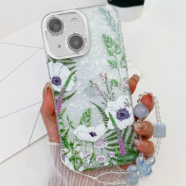 For iPhone 15 Electroplating Flowers Plants Texture Wristband TPU Phone Case