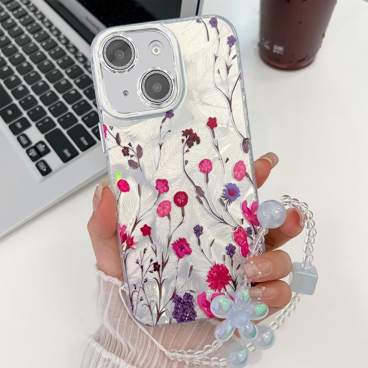 For iPhone 15 Electroplating Flowers Plants Texture Wristband TPU Phone Case