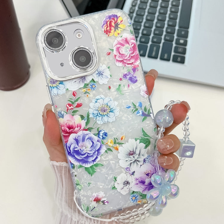 For iPhone 15 Electroplating Flowers Plants Texture Wristband TPU Phone Case