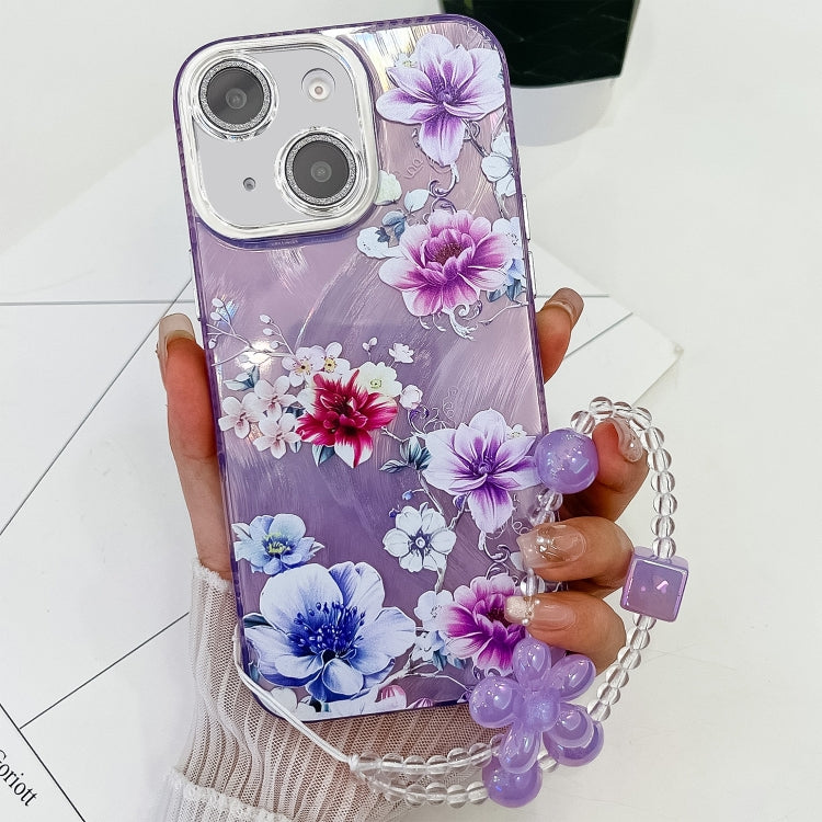 For iPhone 14 Electroplating Flowers Plants Texture Wristband TPU Phone Case