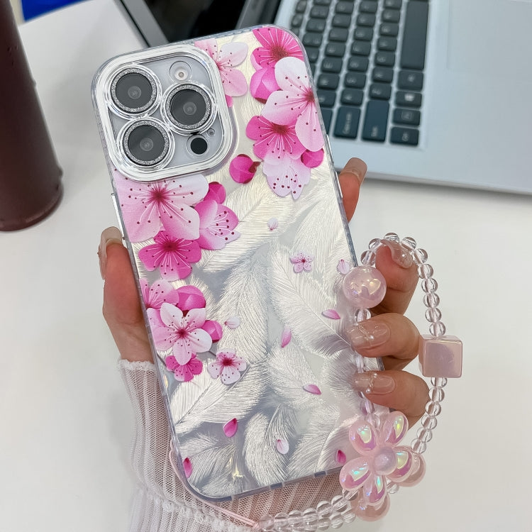 For iPhone 14 Pro Electroplating Flowers Plants Texture Wristband TPU Phone Case