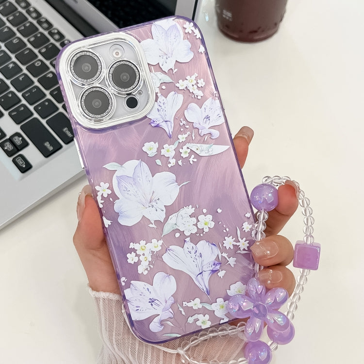 For iPhone 14 Pro Max Electroplating Flowers Plants Texture Wristband TPU Phone Case