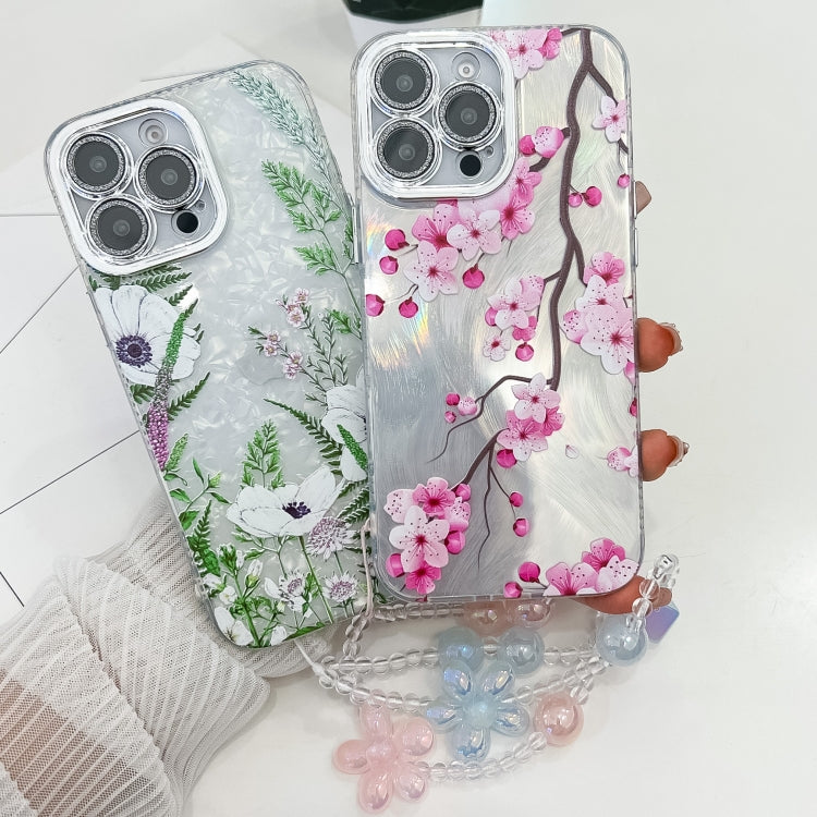 For iPhone 13 Pro Electroplating Flowers Plants Texture Wristband TPU Phone Case