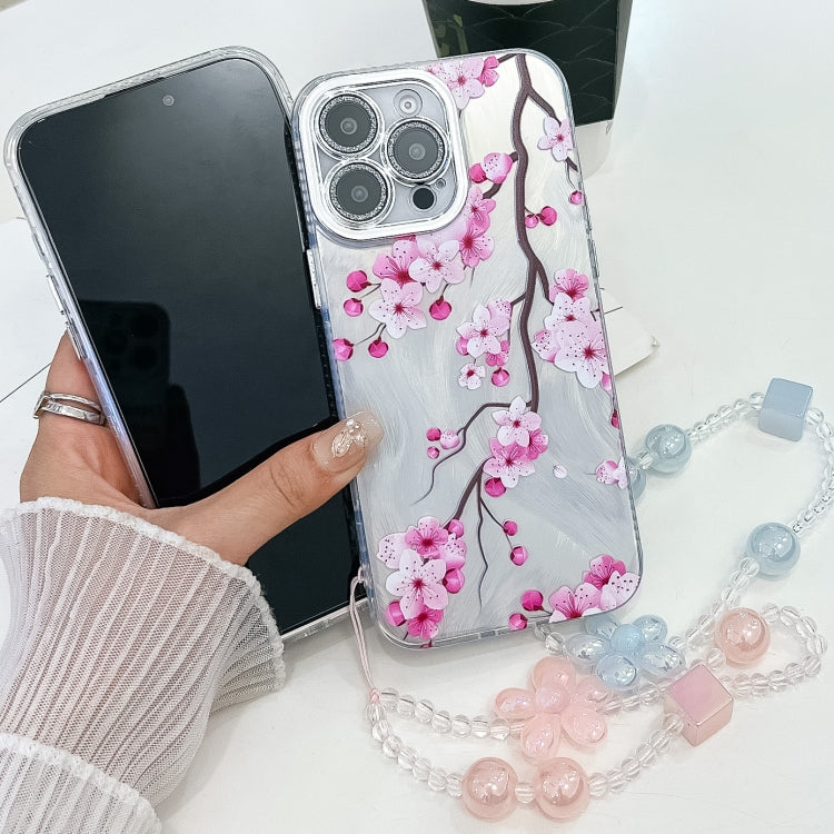 For iPhone 15 Pro Electroplating Flowers Plants Texture Wristband TPU Phone Case