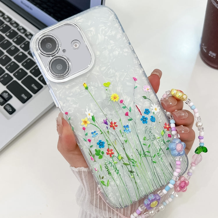 For iPhone 16 Plus Electroplating Flower Texture Wristband TPU Phone Case
