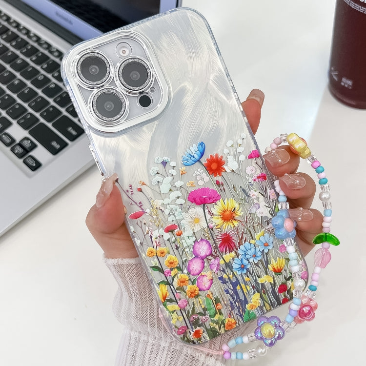 For iPhone 15 Pro Electroplating Flower Texture Wristband TPU Phone Case
