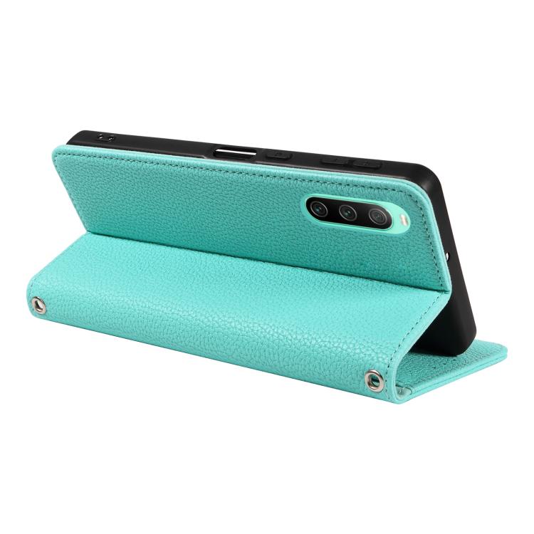 For Sony Xperia 10 IV Litchi Texture Dual-Folded Magnetic Suction Vegan Leather Phone Case with Strap