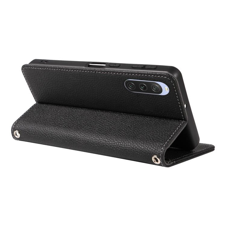 For Sony Xperia 10 V Litchi Texture Dual-Folded Magnetic Suction Vegan Leather Phone Case with Strap
