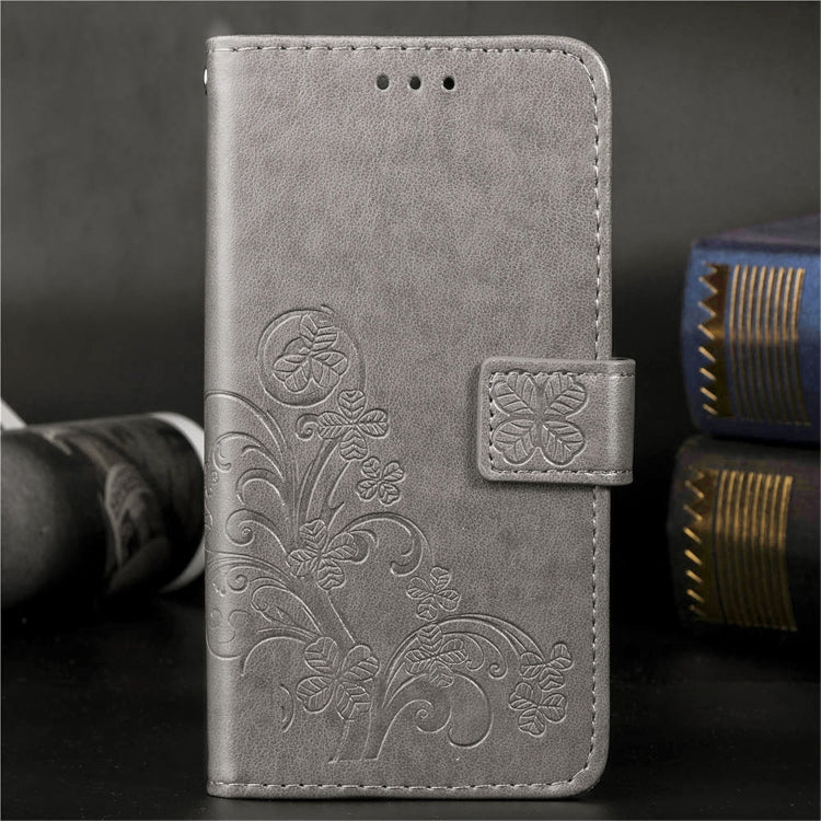 For iPhone 11 Pro Max Four-leaf Clasp Embossed Buckle Mobile Phone Protection Leather Case with Lanyard & Card Slot & Wallet & Bracket Function