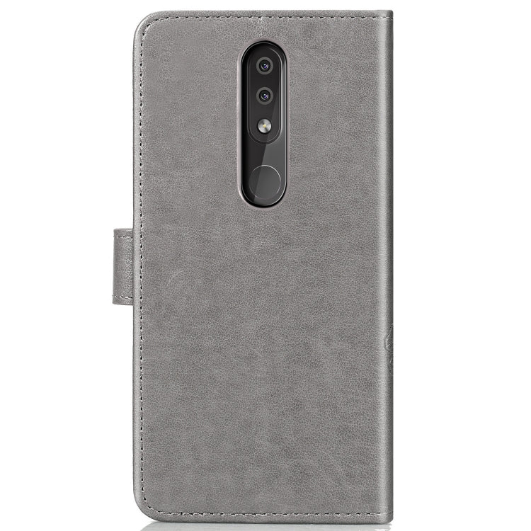 Four-leaf Clasp Embossed Buckle Mobile Phone Protection Leather Case with Lanyard & Card Slot & Wallet & Bracket Function for Nokia 4.4