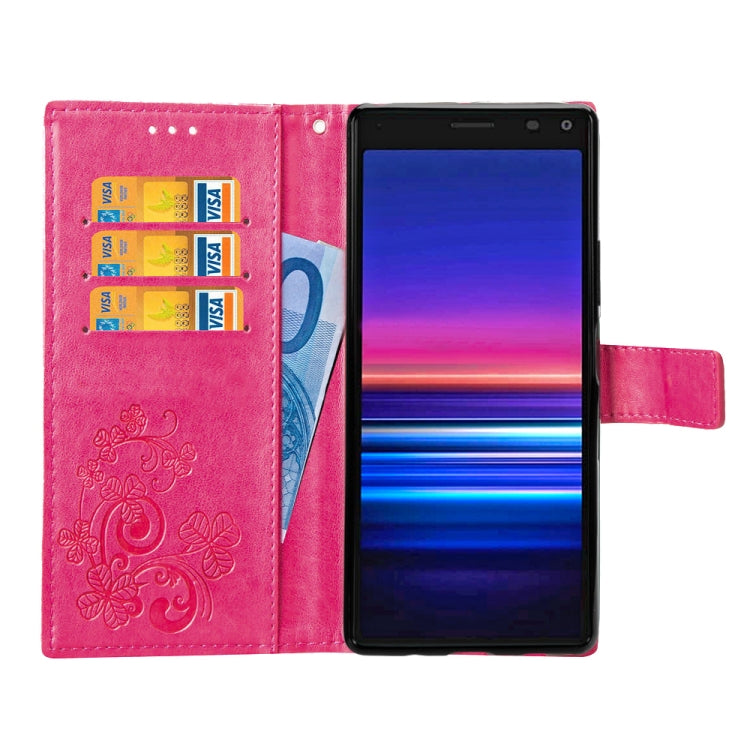 For Sony Xperia 20 Four-leaf Clasp Embossed Buckle Mobile Phone Protection Leather Case with Lanyard & Card Slot & Wallet & Bracket Function
