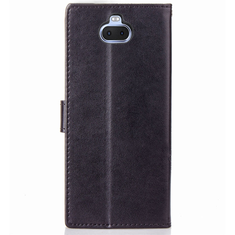 For Sony Xperia 20 Four-leaf Clasp Embossed Buckle Mobile Phone Protection Leather Case with Lanyard & Card Slot & Wallet & Bracket Function
