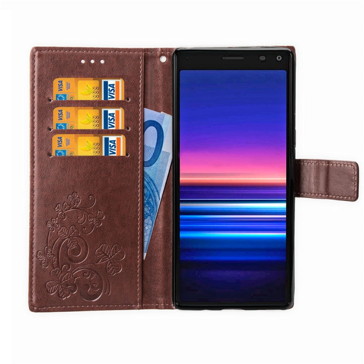 For Sony Xperia 20 Four-leaf Clasp Embossed Buckle Mobile Phone Protection Leather Case with Lanyard & Card Slot & Wallet & Bracket Function