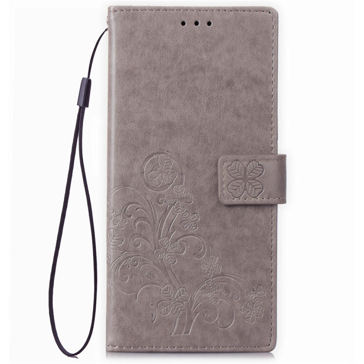 For Sony Xperia 20 Four-leaf Clasp Embossed Buckle Mobile Phone Protection Leather Case with Lanyard & Card Slot & Wallet & Bracket Function