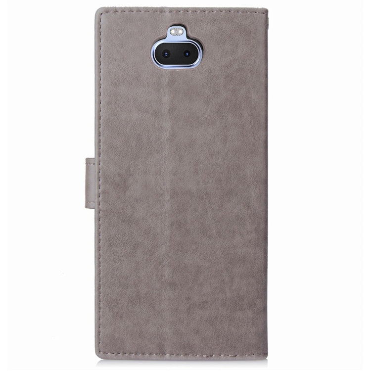 For Sony Xperia 20 Four-leaf Clasp Embossed Buckle Mobile Phone Protection Leather Case with Lanyard & Card Slot & Wallet & Bracket Function