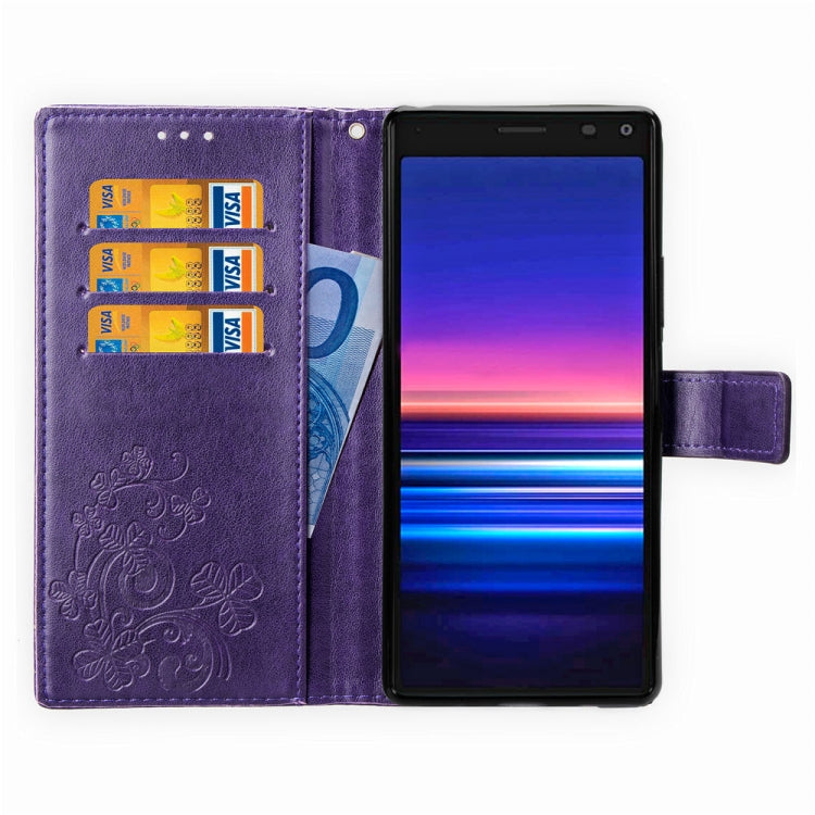 For Sony Xperia 20 Four-leaf Clasp Embossed Buckle Mobile Phone Protection Leather Case with Lanyard & Card Slot & Wallet & Bracket Function
