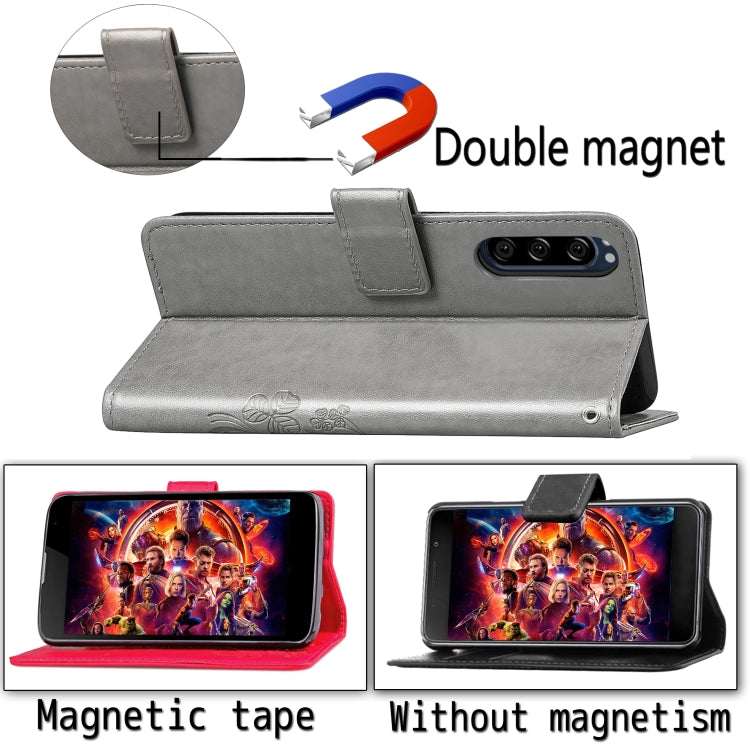 For Sony Xperia 5 Four-leaf Clasp Embossed Buckle Mobile Phone Protection Leather Case with Lanyard & Card Slot & Wallet & Bracket Function