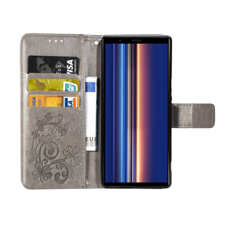 For Sony Xperia 5 Four-leaf Clasp Embossed Buckle Mobile Phone Protection Leather Case with Lanyard & Card Slot & Wallet & Bracket Function