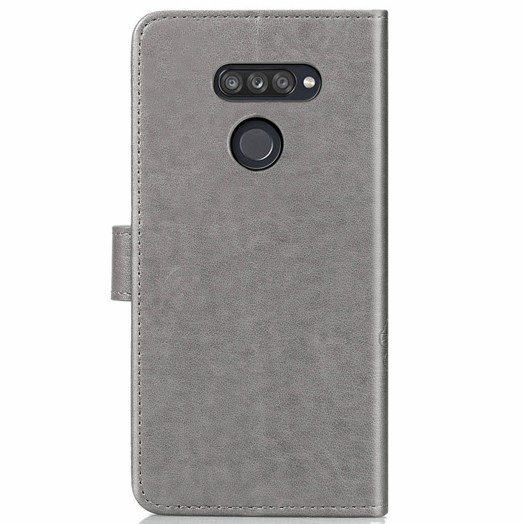 For LG K50S Four-leaf Clasp Embossed Buckle Mobile Phone Protection Leather Case with Lanyard & Card Slot & Wallet & Bracket Function