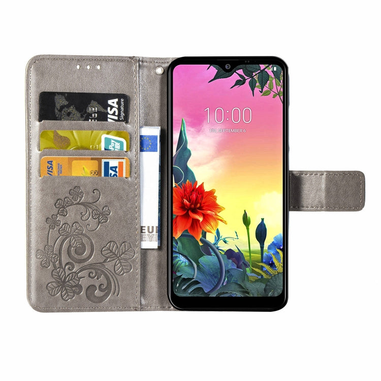 For LG K50S Four-leaf Clasp Embossed Buckle Mobile Phone Protection Leather Case with Lanyard & Card Slot & Wallet & Bracket Function