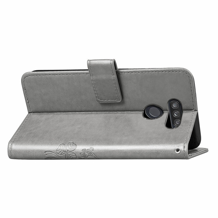 For LG K50S Four-leaf Clasp Embossed Buckle Mobile Phone Protection Leather Case with Lanyard & Card Slot & Wallet & Bracket Function