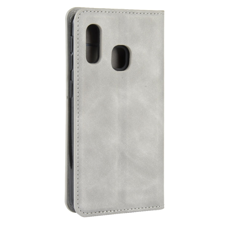 For Galaxy A20e Retro-skin Business Magnetic Suction Leather Case with Holder & Card Slots & Wallet