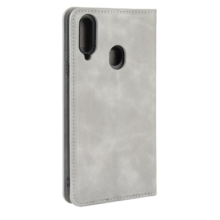 For Galaxy A20s Retro-skin Business Magnetic Suction Leather Case with Holder & Card Slots & Wallet