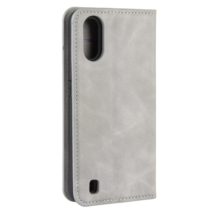 For Galaxy A01 Retro-skin Business Magnetic Suction Leather Case with Holder & Card Slots & Wallet