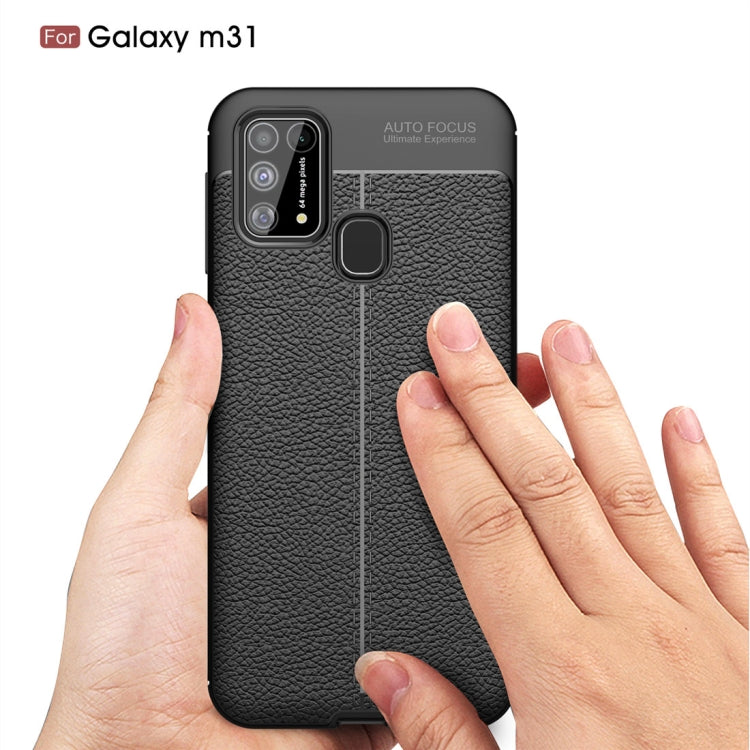 For Galaxy M31 Litchi Texture TPU Shockproof Case(Navy Blue)