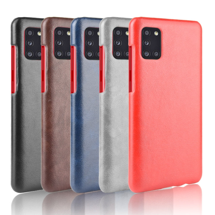 For Galaxy A31 Shockproof Litchi Texture PC + PU Case