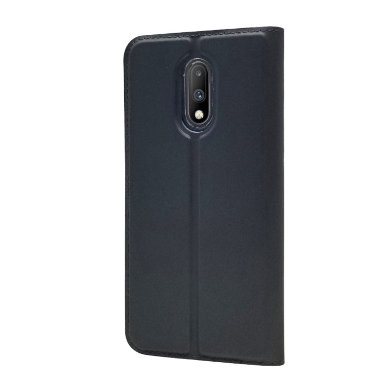 Electric Pressed Plain Texture Ultra-thin Magnetic Suction TPU + PU Leather Case for OnePlus 7, with Holder & Card Slot