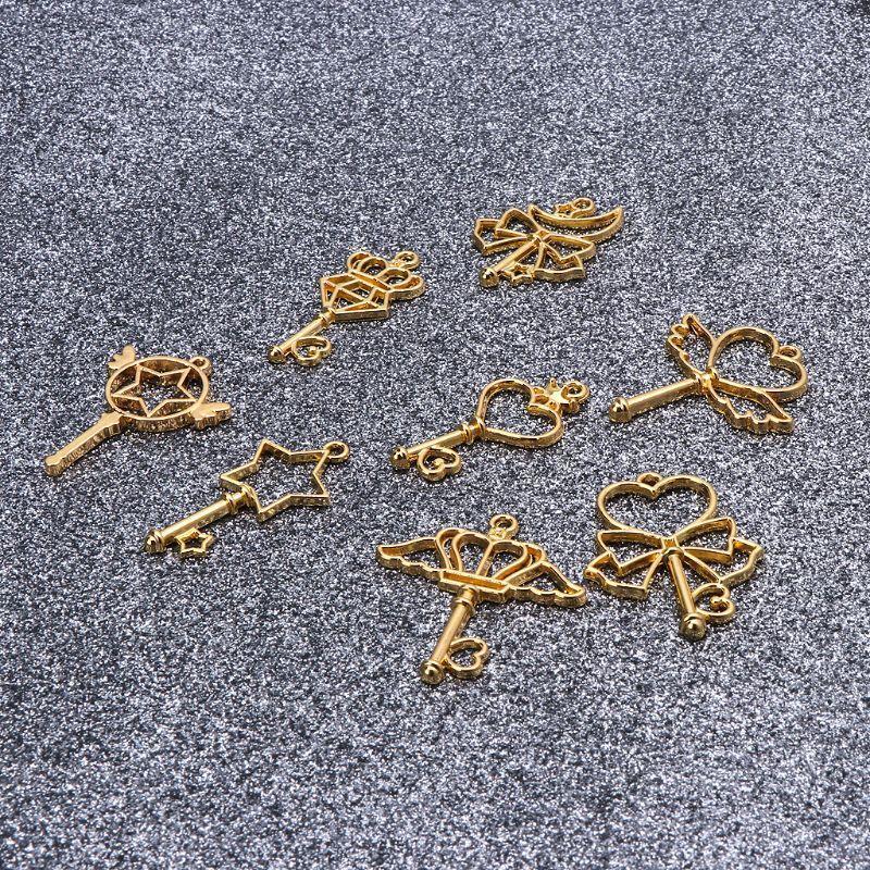 8 Pieces Exquisite Open Bezel Pendants Charms Wand Heart Key Shape Hollow Charm