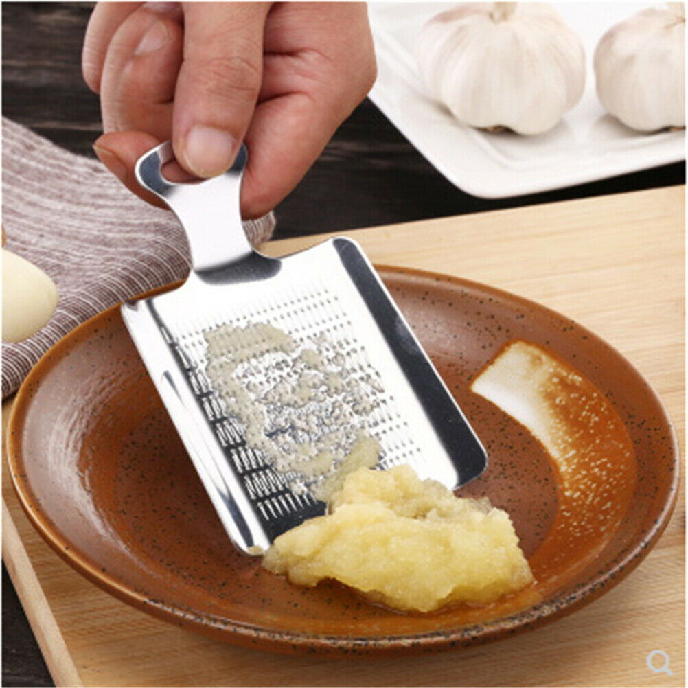 Stainless Steel Ginger Garlic Press Crusher Mini Garlic Grater Slicer .l8