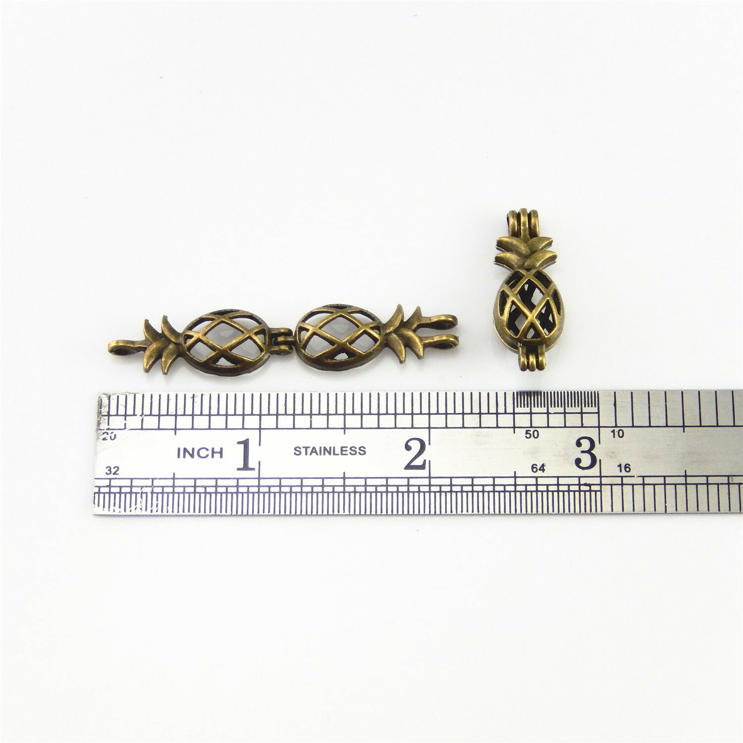 4 pcs Antiqued Bronze Alloy Hollow Pineapple Locket Oil Diffuser Charms Pendants