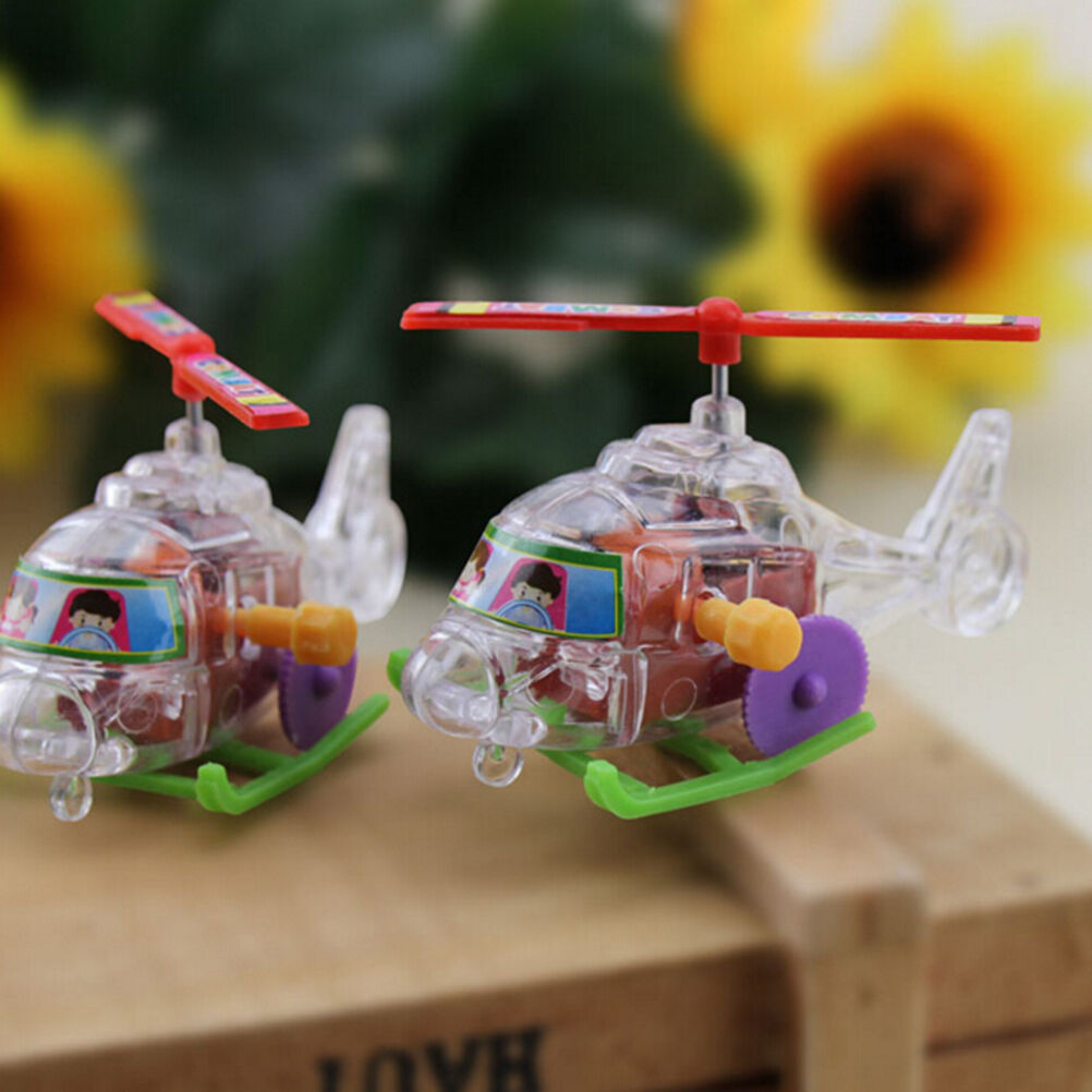 1x Mini Clockwork Transparent Aircraft Somersault Running Wind Up To.l8