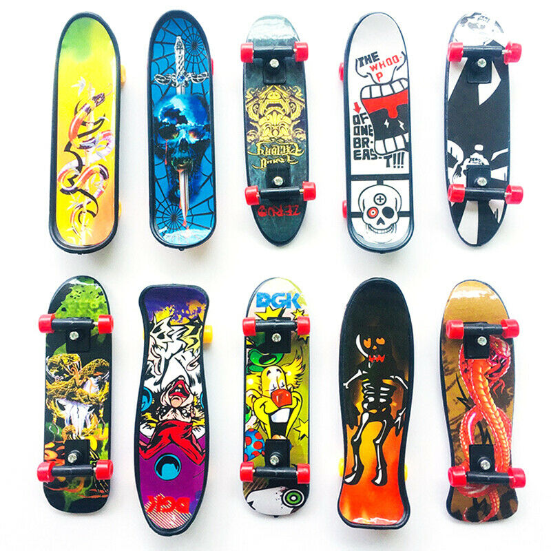 1pc Fingerboard Mini Creative Fingertips Skateboard Plastic Finger Skate .l8
