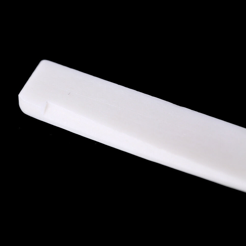 1pc 72MM* 3MM * 9MM Bone Bridge Saddle For Folk Acoustic Guitar accessor .l8