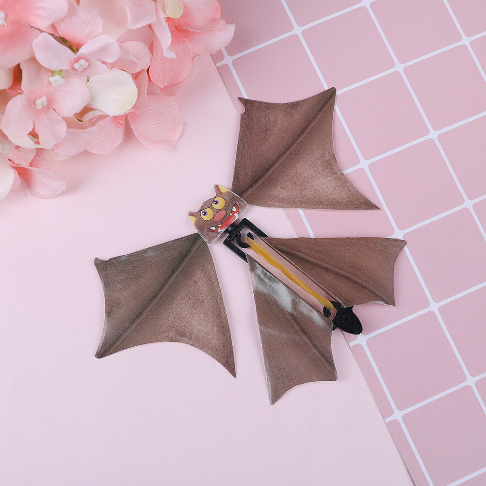 Magic flying bat prank flying paper bats funny halloween card gif.l8