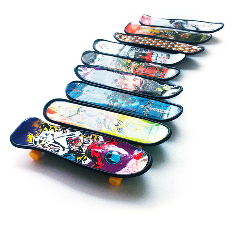 1pc Fingerboard Mini Creative Fingertips Skateboard Plastic Finger Skate .l8